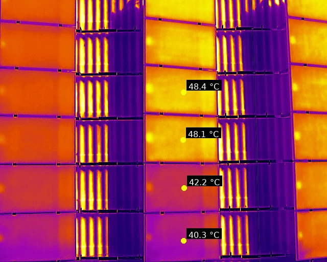 Thermal image of a rooftop system in Celje, the modules of a failed string are uniformly warmer than their neighbours